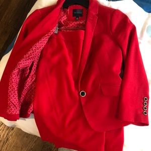 Red skirt suit